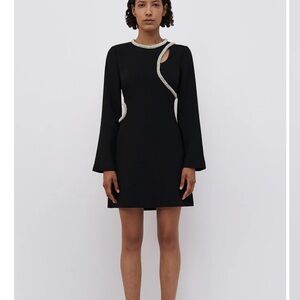 Elegant Black Dress with Unique Cutout Design